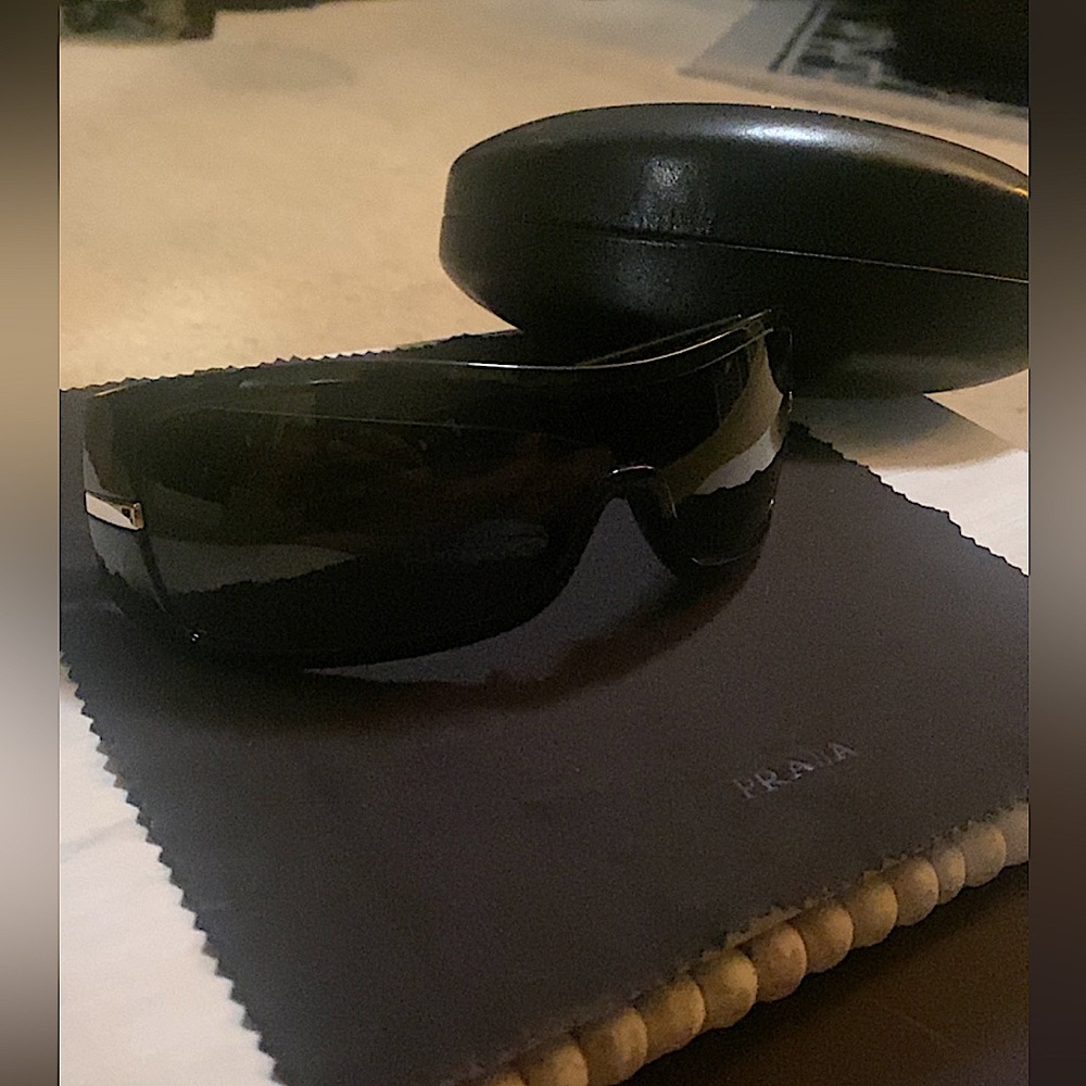 Prada designer sunglasses! Men or WOMEN! TRENDY! willing to negotiate price!